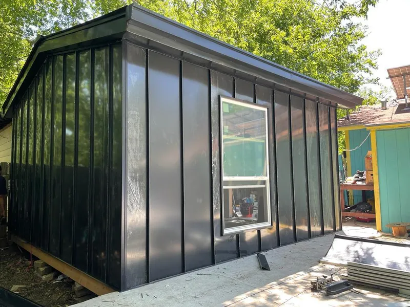 Black standing seam metal wall panels for Metal Roof Installation in Darlington