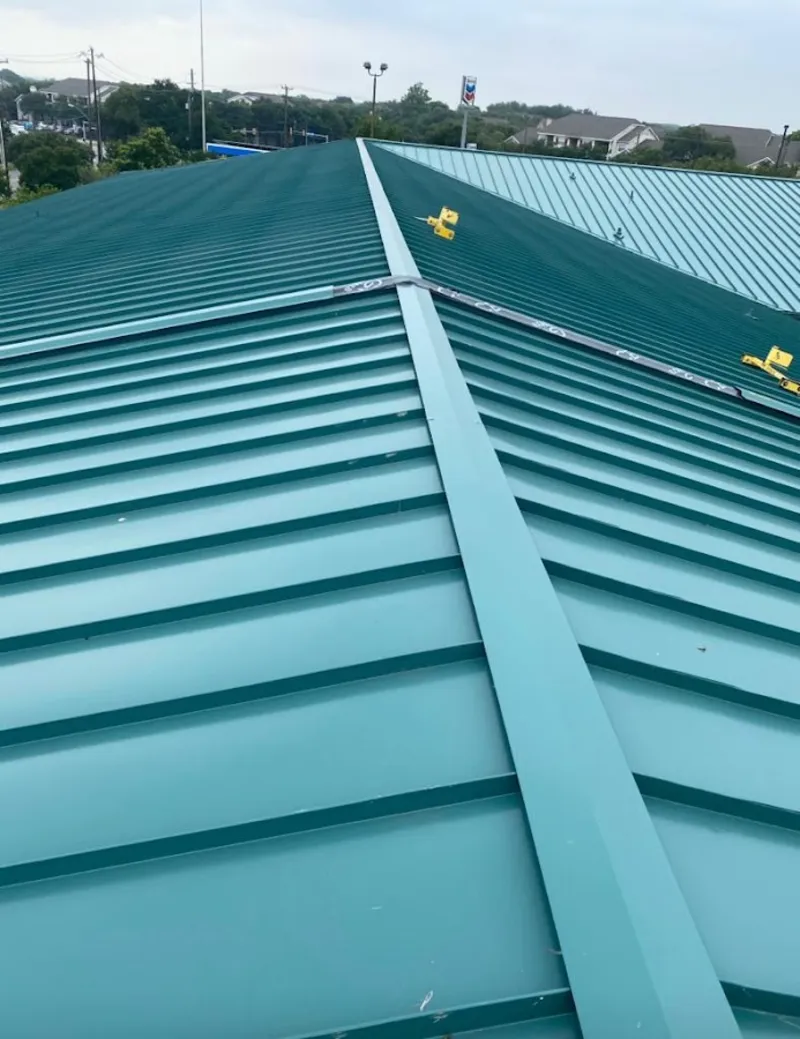 Green commercial metal roof ridge and valley for Metal Roof Repair in Darlington